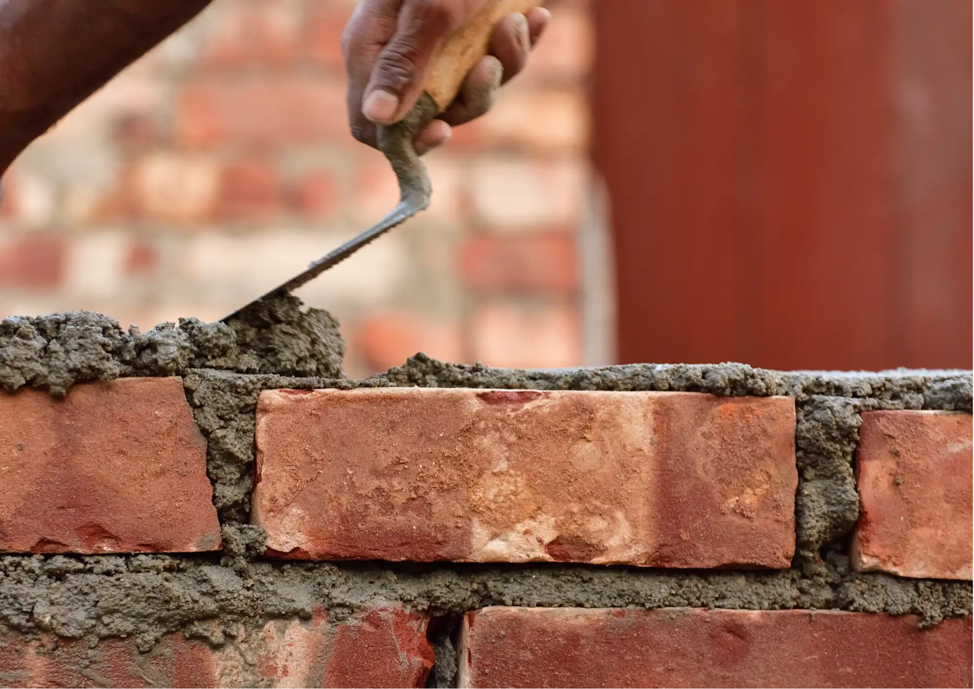 Bricklaying with a trowel and mortar