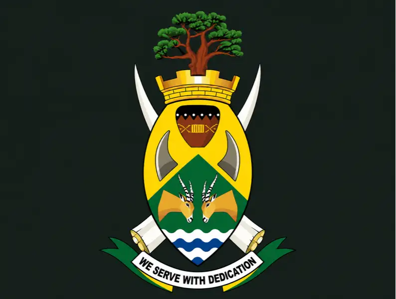 We Serve With Dedication coat of arms